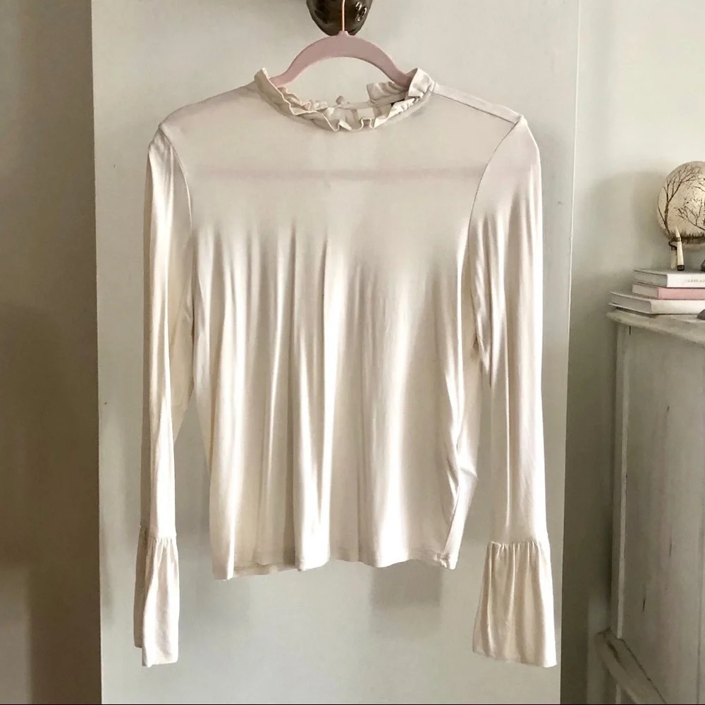 Topshop loose long sleeves top. Size 6
